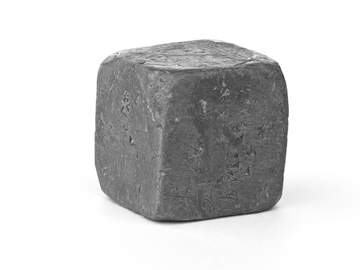 a cube of pure lead metal against a white background 