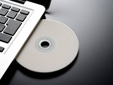 blank disc inserted into laptop