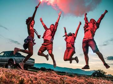 car trip millennials jumping around with fire sticks in a parched landscape definitely a fire hazard and quite possibly the reason for the collapse of civilization which okay