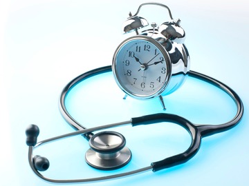 clock with stethoscope health span