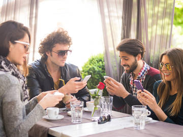 friends ignoring each other
