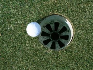 golf-ball-just-missing-cup