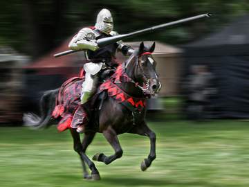 knight jousting on horseback
