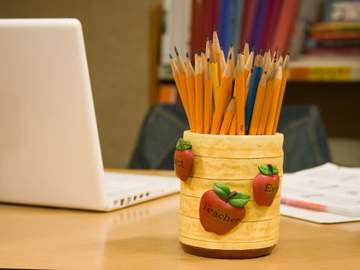 pencils on desk in school office