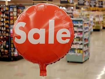 red sale balloon in grocery store