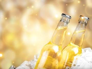 two light beers on ice