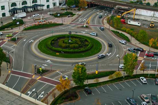 aerial still featuring the washington square rotary clock and roundabout near union station in worcester massachusetts 