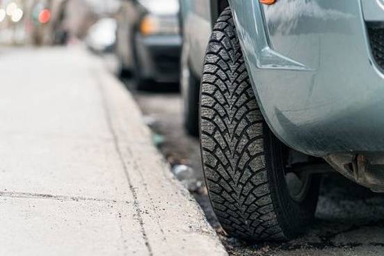 car-parked-by-curb