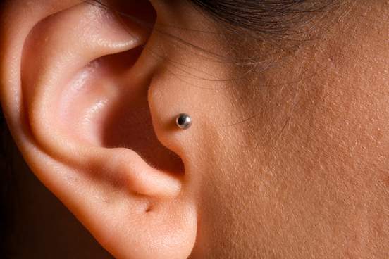 close-up photo of a pierced tragus