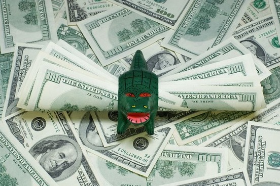 dragon toy on money photo