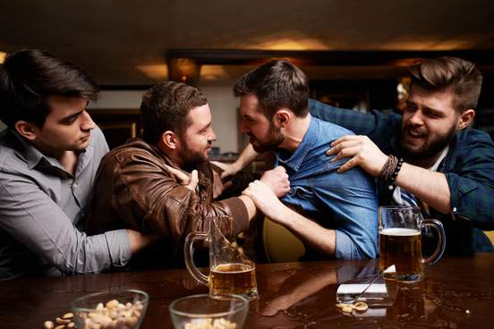 drunk men fighting in pub