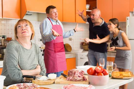 family arguing while cooking dinner