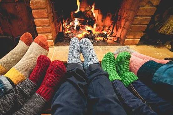 family-with-feet-by-fire