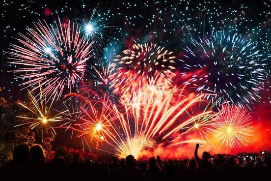 fireworks and cheering crowd