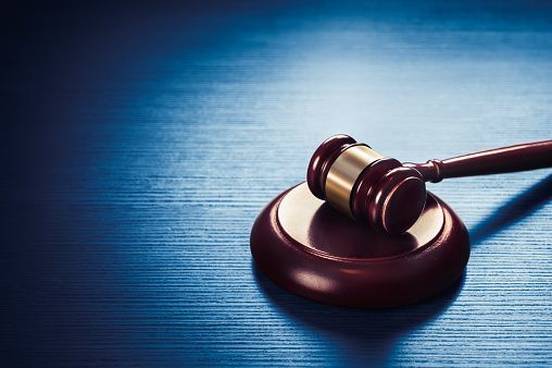 gavel-on-blue-background