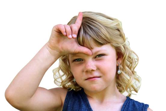 girl making loser sign on her forehead with fingers shaped like an l