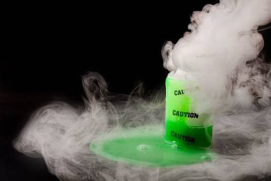 green chemicals leaking from jar
