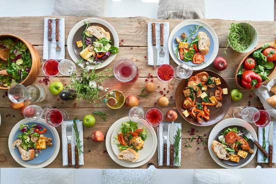 high angle view of served dining table full of healthy food