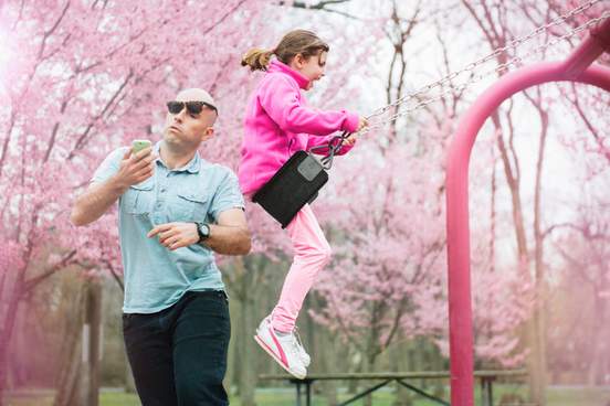 inattentive parent hit by daughter on swing