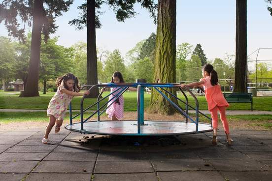 kids in playground running counterclockwise 