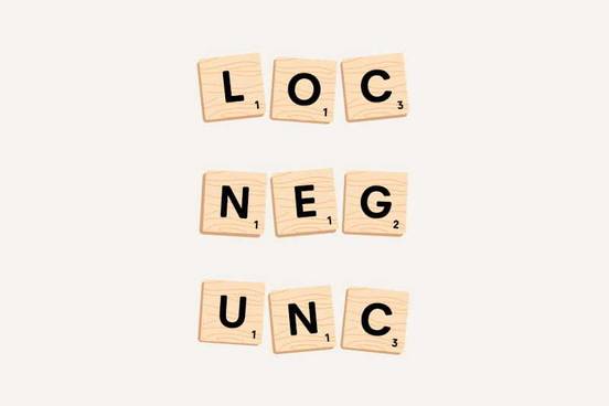 the words loc, neg, and unc spelled out with scrabble letters