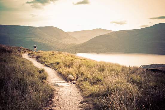 lone hiker walking on ben lomond mountain