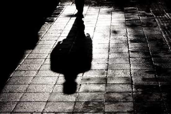 long shadow on sidewalk