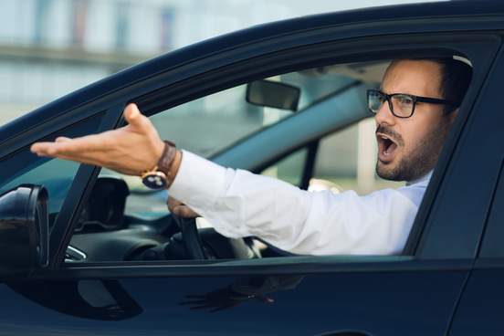 man yelling out car window