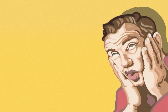 man holding face in hands