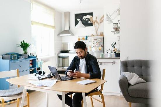 man-working-at-table