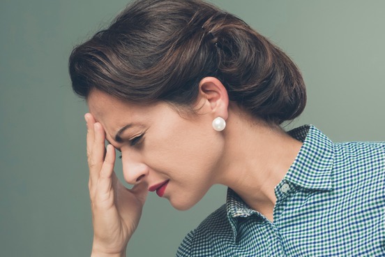 megrim headache woman