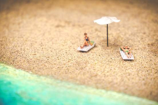 miniature figurines on a beach