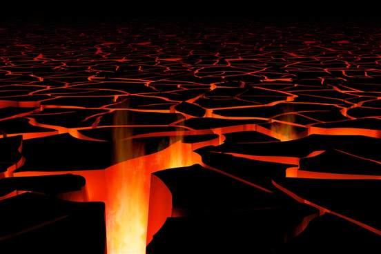 molten landscape with cracks in the ground and lava showing through