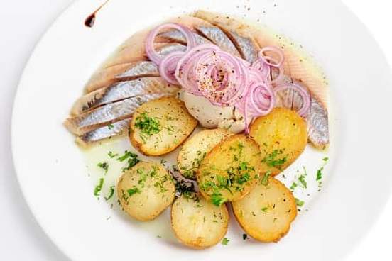 pickled herring and potato plate