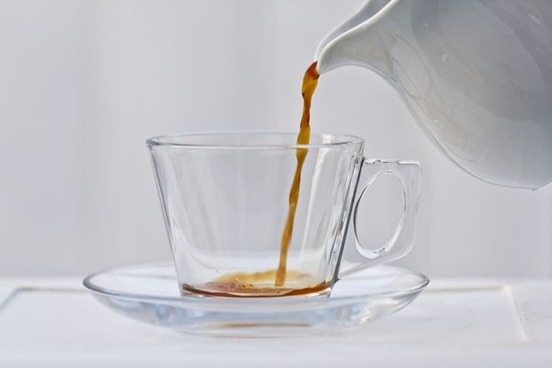 scruple words for small things pouring tiny amount of coffee photo