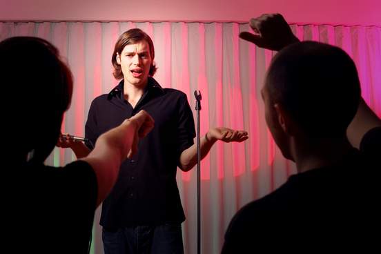 standup comedian getting booed on stage
