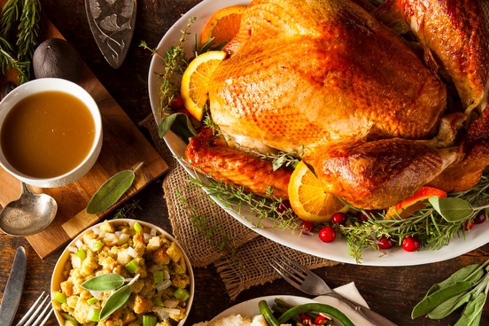 thanksgiving meal with turkey and gravy
