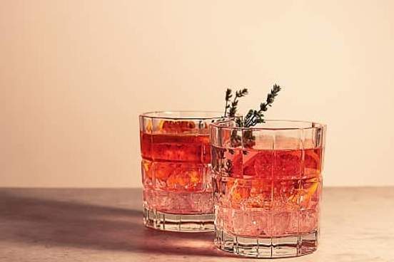 two pink gin drinks