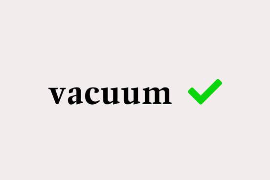 vacuum with green check mark