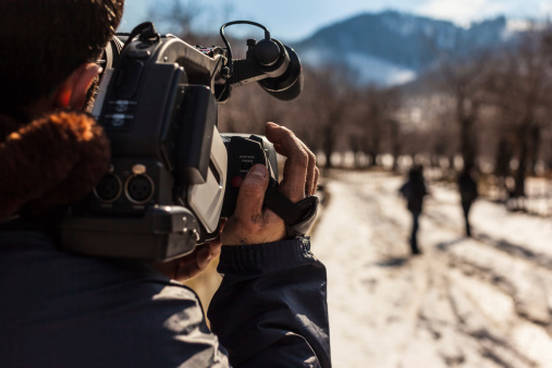 videographer filming people