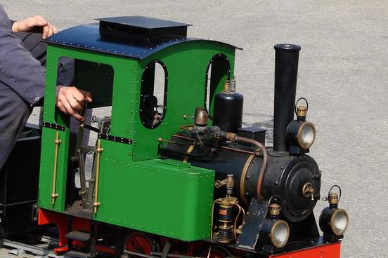 we cannot see who is driving the locomotive but we can imagine that he has a small and wistful smile as the engine hums along the tracks pulling the man and his childhood memori