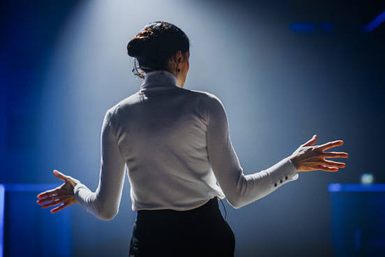 woman delivering speech
