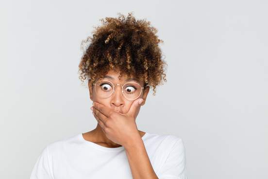 woman looking shocked