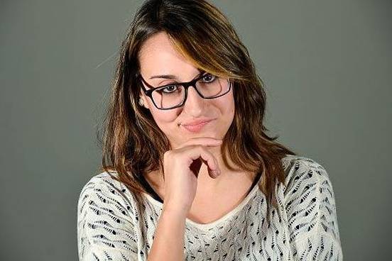 woman smirking at camera