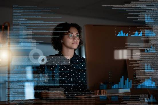 woman writing computer code photo