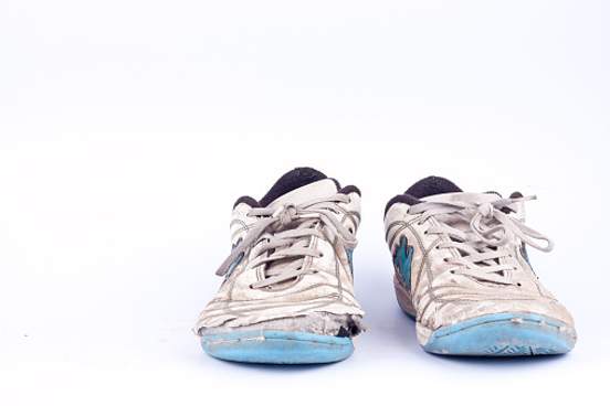 worn out tennis shoes