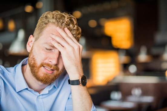 young man facing regret