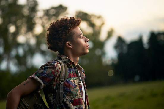 young man looking thoughtful