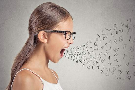 young woman yelling with letters coming out of her mouth