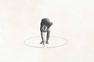 Man drawing a circle around himself on the ground